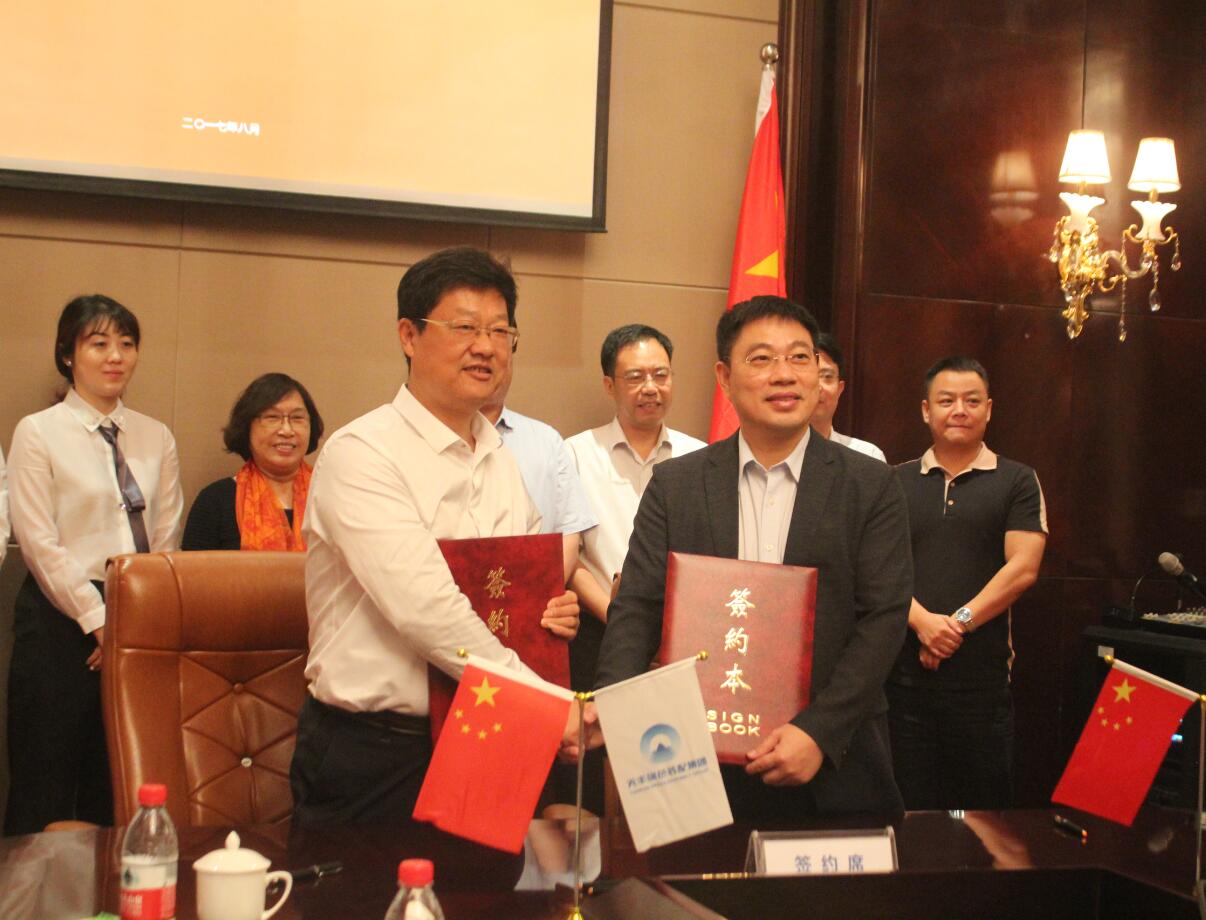华夏微影文化传媒中心与华体会（中国）绿色装配集团签约